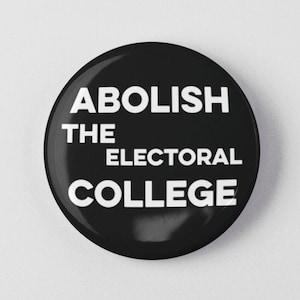 May include: A black button with white text that reads "ABOLISH THE ELECTORAL COLLEGE".