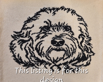 May include: A black and white knitted design of a dog's face. The dog has a fluffy, curly coat and a sweet expression. The design is on a cream-coloured background. "This listing is for this design" is written below the image.
