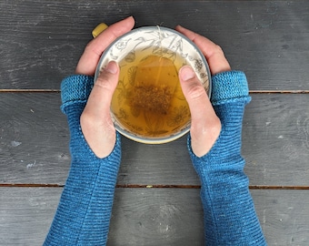 Knitted lambswool reversible wrist warmers in two tone blue