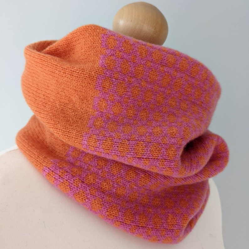 Lambswool knitted Fairisle cowl in dots and spots design orange and pink image 1