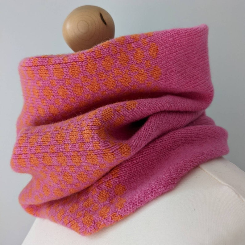 Lambswool knitted Fairisle cowl in dots and spots design orange and pink image 2