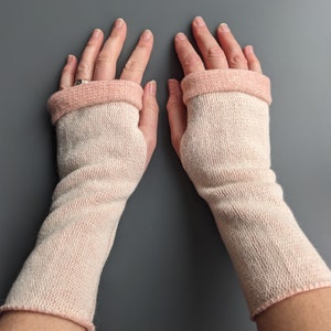 Knitted lambswool reversible wrist warmers in pastel pink and ecru image 5