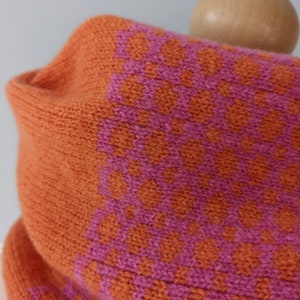 Lambswool knitted Fairisle cowl in dots and spots design orange and pink image 4