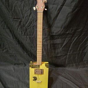 21" scale  cigarbox guitar.