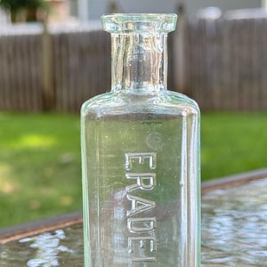 Vintage Eradeline Glass Bottle -  Antique Collectible – Aqua Blue Glass Bottle