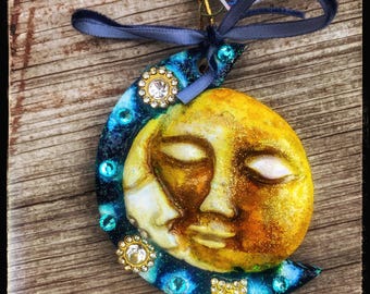 Sleepy Moon and Sun Crescent Ornament by Bluemoose Art