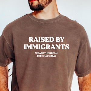 Comfort Colors Raised By Immigrants Shirt, Social Justice Activist Tee, Pro Immigration Gift, Human Rights T-Shirt, Equality Statement