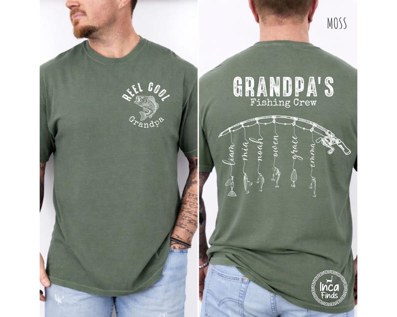 May include: A moss green short-sleeve t-shirt featuring white graphics. The front displays a fish and the text "REEL COOL Grandpa". The back shows a fishing rod with lines hanging down, each ending in a lure and a name, with the text "GRANDPA'S Fishing Crew".