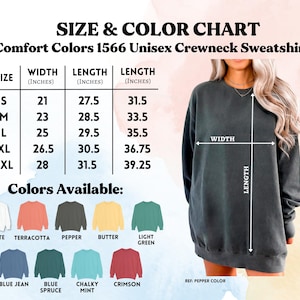 Op de afbeelding: Maat- en kleurentabel voor een Comfort Colors 1566 Unisex Crewneck Sweatshirt. De tabel toont de breedte- en lengtematen in inches voor de maten S t/m 2XL. Beschikbare kleuren zijn wit, terracotta, peper, boter, lichtgroen, blue jean, blauwe spar, krijtachtige munt en karmozijn.