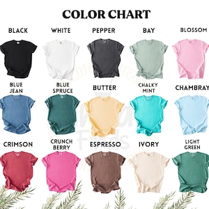 May include: A colour chart displaying t-shirts in shades such as black, white, pepper, bay, and blossom. Additional colours include blue jean, blue spruce, butter, chalky mint, chambray, crimson, crunch berry, espresso, ivory, and light green.
