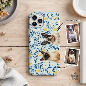 May include: A light blue smartphone case featuring a pattern of yellow lemons and dark blue leaves. The case displays a custom illustration of a French Bulldog and a Siamese cat, with the text "Smokie & Rocky" printed in a black script font.