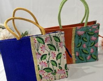 Full Jute bag with half side lotus print fabric stitched with zip closure