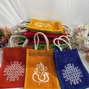 Jute bag with one side Ganesha print and other side Kolam print