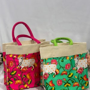 Jute bag with cow pichwai theme