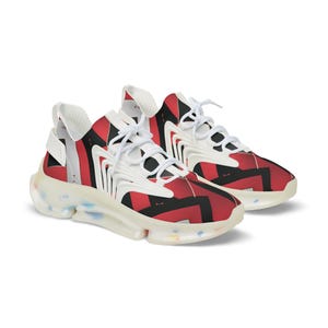 May include: A pair of athletic shoes with a bold red and black geometric pattern. The shoes have white accents, laces, and a translucent sole with colorful flecks. The design is modern and eye-catching.
