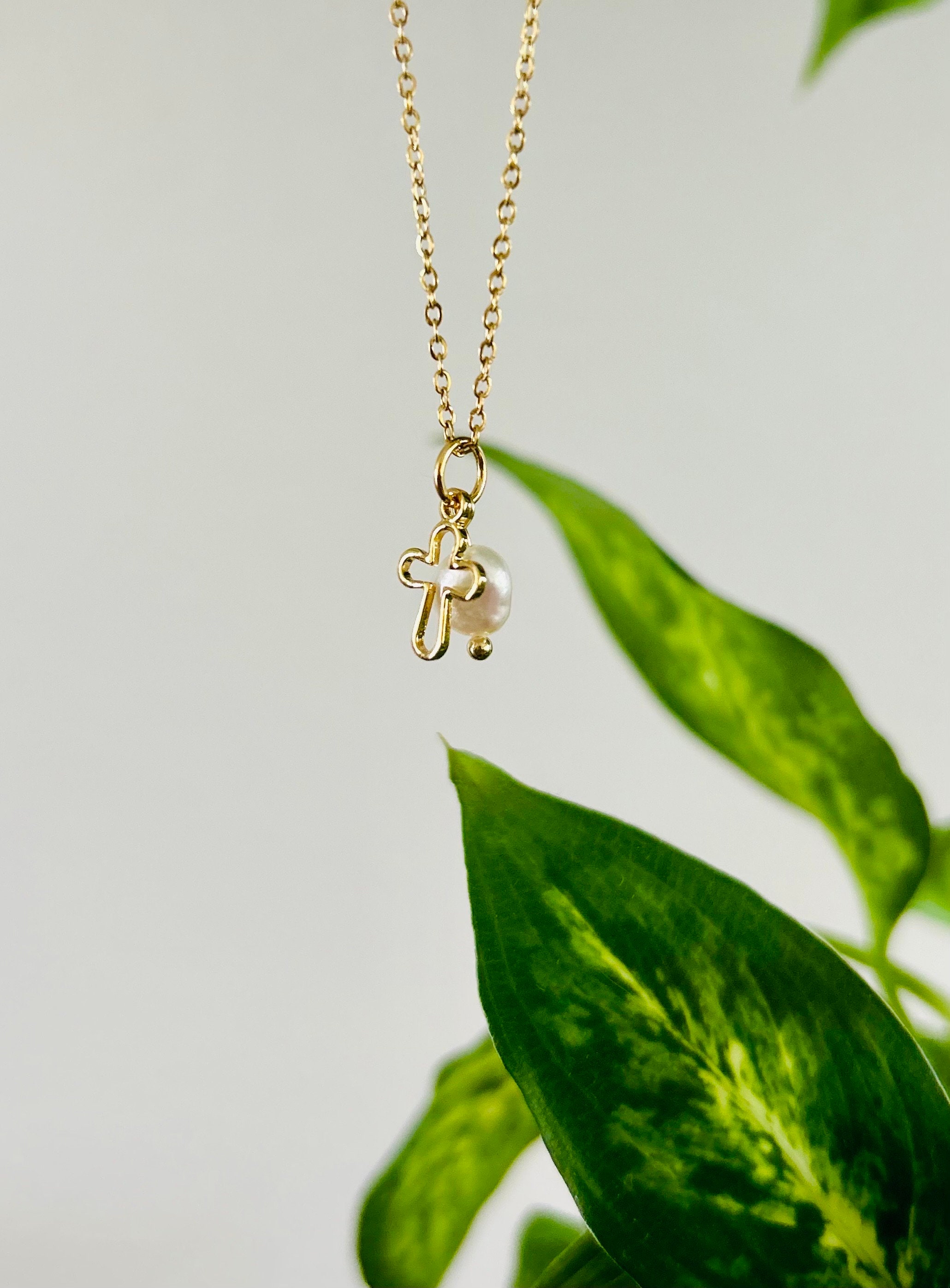 Wellen des Glaubens 18k Gold Kreuz natürliche echte Zuchtperle