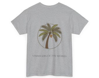 Camiseta — Ghuraba Al Dunya Palm Tree Tee ("Extraños del mundo")