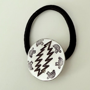 steal your face pony tail holder with crystal accents