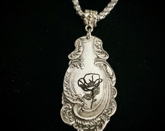Silver spoon handle pendant with poppy flower