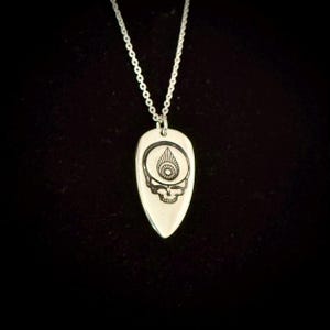 Recycled Silver Spoon Dead Steal Your Face pendant with deco design