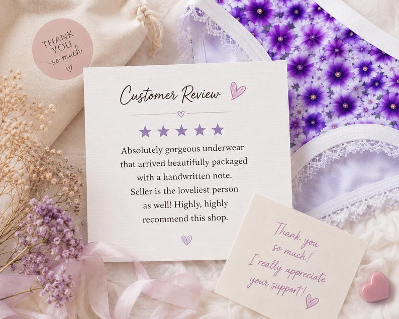 May include: A close-up of a customer review card and a thank you card, with a pair of purple floral underwear. The review card reads "Absolutely gorgeous underwear that arrived beautifully packaged with a handwritten note."