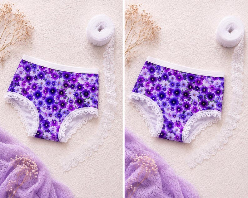 May include: A pair of purple floral print underwear with white lace trim. The underwear features a pattern of purple and white flowers. The waistband is white. The background is a light beige color.