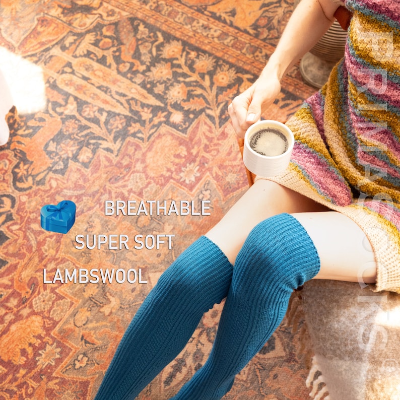 May include: A pair of teal blue knee-high socks made of soft lambswool. The socks are breathable and super soft.