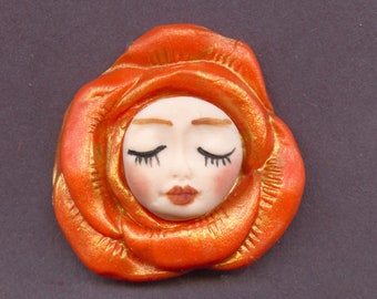 Polymer Clay Face in Tangerine  Cab  White with gold 1 1/2" x 1 1/2"   A 1