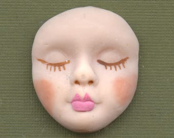 One  Polymer Closed Eyed Baby Face ABC