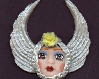 Polymer  Fleshtone Angel  Face with Wings in  Metallic Pearl  2 1/2"   x 3"    A43