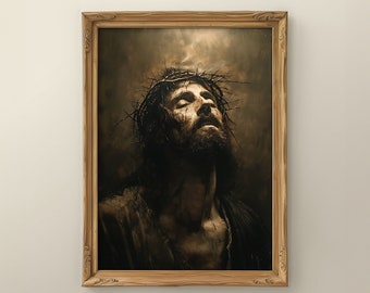 Puede incluir: Una pintura enmarcada de un hombre con una corona de espinas en la cabeza. Él está mirando hacia arriba con los ojos cerrados y la boca ligeramente abierta. La pintura está hecha en un estilo oscuro y dramático.