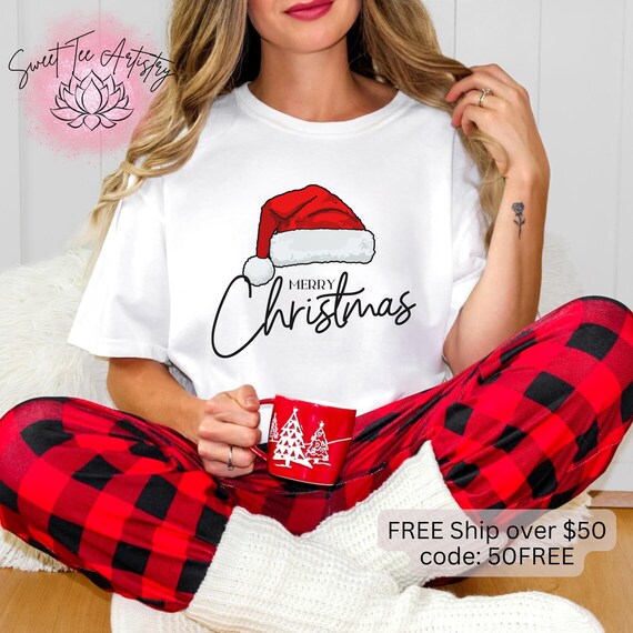 Festive Merry Christmas Tee - Santa Hat Shirt for a Jolly Christmas - Spread Cheer with this Merry Christmas Cozy Sweatshirt