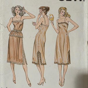 May include: Vintage Kwik Sew sewing pattern 941 featuring illustrations of women in slip dresses. The pattern includes sizes XS-L. The cover has the text "KWIK SEW" and "DESIGNED BY: KERSTIN MARTENSSON".