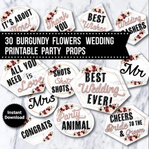 May include: Thirty printable wedding party props featuring burgundy flowers and marble backgrounds. The props include phrases like "It's About Time!" and "Best Wedding Ever!"