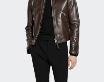 May include: A brown leather motorcycle jacket with a zipper closure and a stand-up collar.