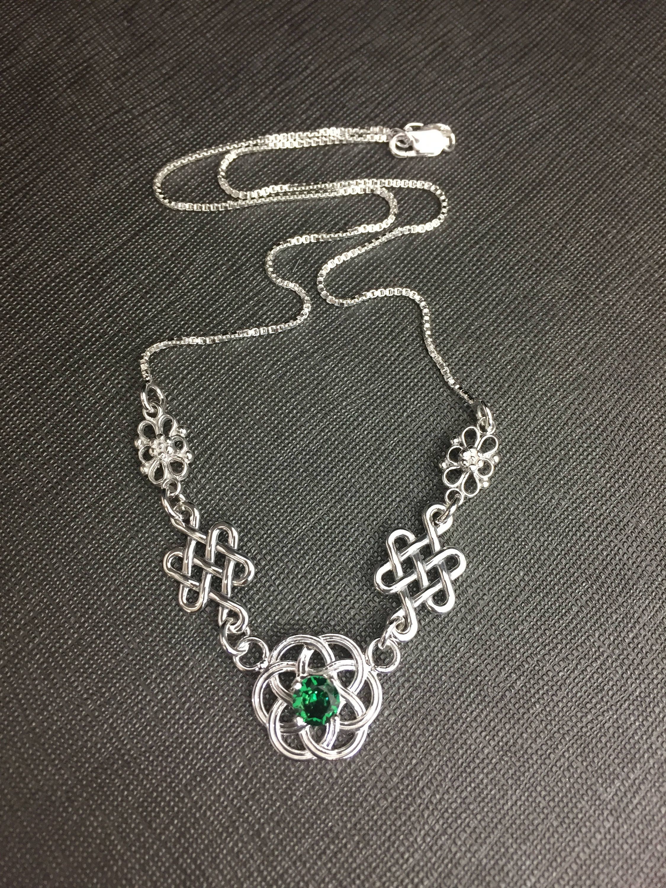 Emerald celtic sale knot necklace