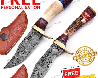 May include: Two handmade hunting knives with patterned blades and bone handles, accented with brass bolsters and colorful wrappings. Each knife has the name "JAMES" etched on the blade. Leather sheaths are included. The image also includes the text "FREE PERSONALISATION".