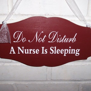 Do Not Disturb A Nurse Is Sleeping Wood Vinyl Sign Primitive Country Red Scalloped Design Style Door Wall Hang Quiet Please Night Worker image 1