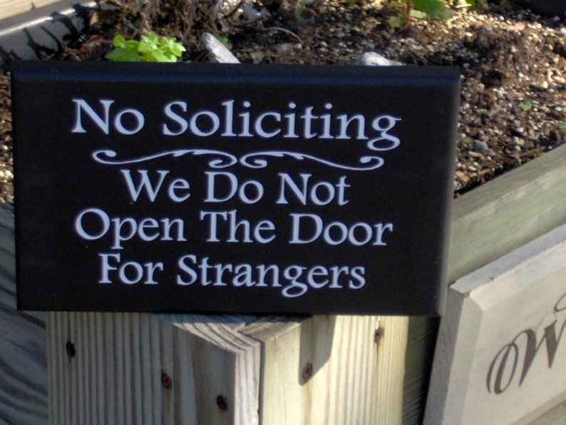 No Soliciting We Do Not Open The Door For Strangers Wood Sign for wall or door.  9" x 5.5" - color options as well as different display methods are available.