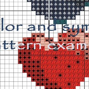May include: A cross-stitch pattern example with a red apple design. The chart includes a grid with color and symbol keys, and the text "Color and symbol pattern example".