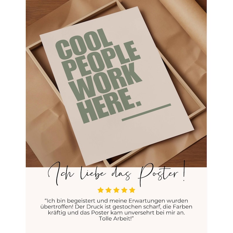 May include: A framed poster with the text "COOL PEOPLE WORK HERE" in green letters on a cream background. The poster is set against a brown paper backdrop.