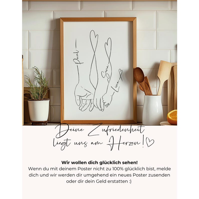 May include: A framed art print featuring a black line drawing of intertwined hands with heart-shaped extensions. Names are written above the hands. The print is in a wooden frame, with text below in German.