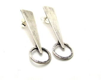 Triangular Silver Earrings. Textured silver and matte finish. Geometric and minimalist piece. Signature Jewelry