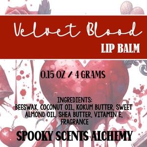 May include: Lip balm product label with the text "Velvet Blood" and "Lip Balm." The label includes the weight, ingredients, and the brand name "Spooky Scents Alchemy." The design features a heart with blood-like drips.