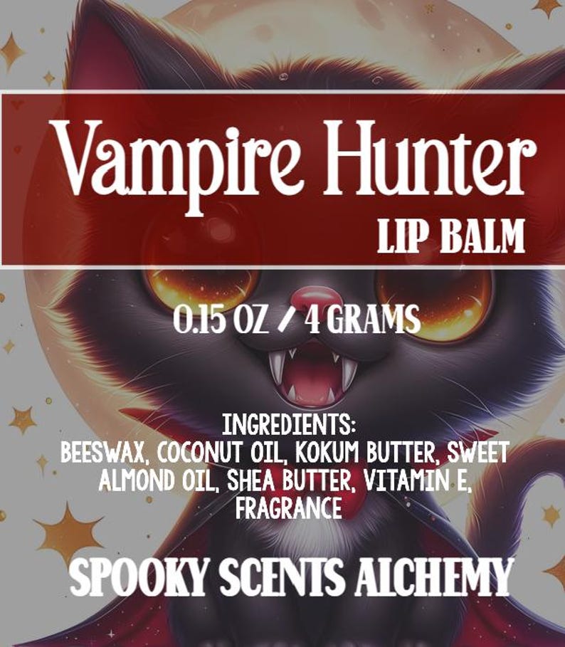 May include: Lip balm with a black cat illustration. The label reads "Vampire Hunter LIP BALM" and lists ingredients. The product weighs 0.15 oz / 4 grams. The brand name "Spooky Scents Alchemy" is also displayed.