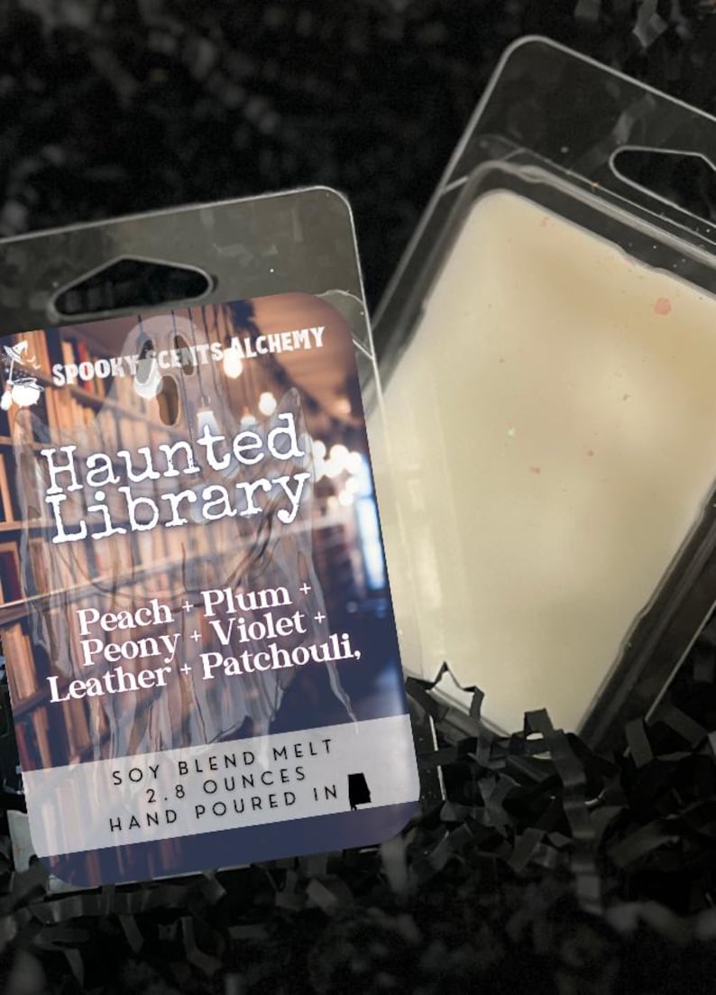 May include: A soy blend wax melt in a clear plastic package. The label reads "Haunted Library" with scent notes of peach, plum, peony, violet, leather, and patchouli. The package contains 2.8 ounces of wax.