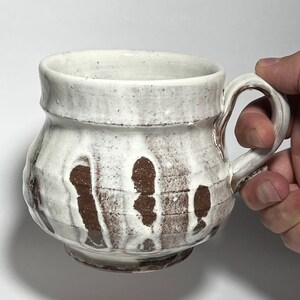Steven Colby pottery mug 2026. Hand Made Wheel Thrown Terra Cotta coffee cup.