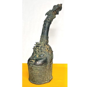 Head of an Oba in the shape of a Horn.  Benin Kingdom Bronze. Life Size.