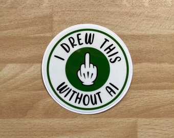 May include: A white round sticker with a green circle in the center. The green circle has a white hand giving the middle finger. The text around the circle reads "I drew this without AI".