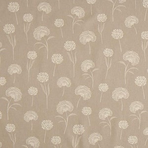 May include: A beige fabric with a white floral pattern of stylized dandelions. The fabric has a subtle texture.